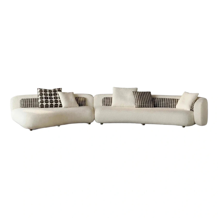 Curved Cream Boucle Sectional Sofa with Geometric Pillows