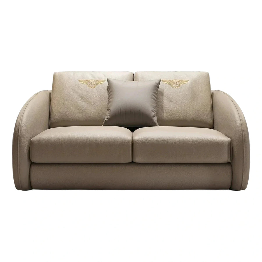 Modern Beige Leather Loveseat with Gold Winged Emblem