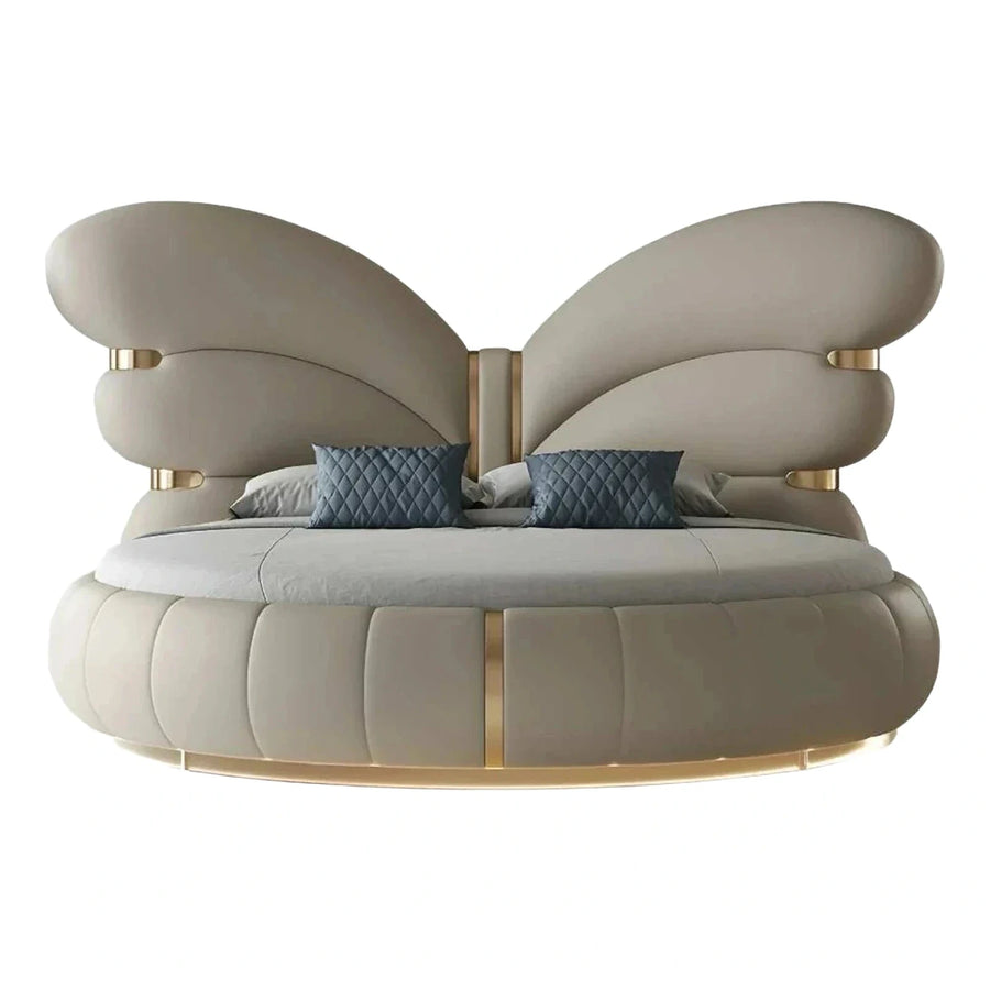 Luxury Round Bed with Winged Headboard and Gold Accents