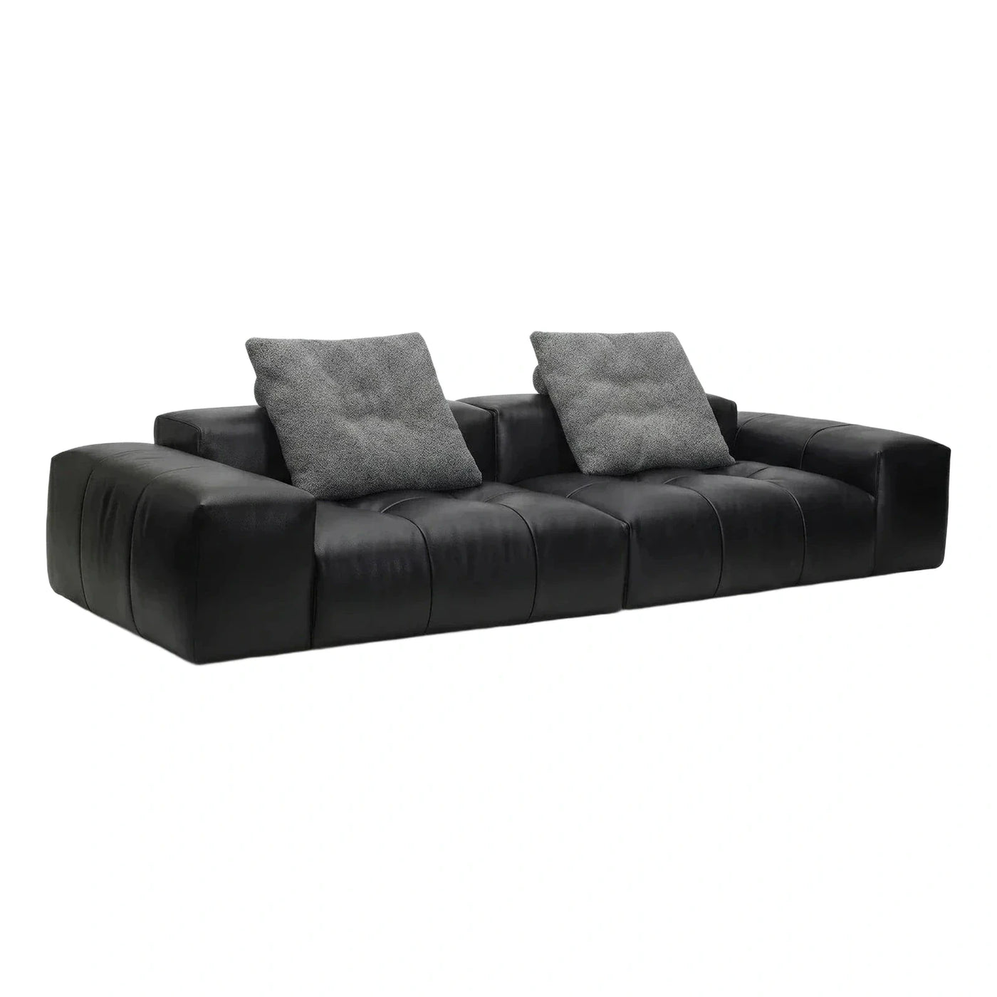 Black Leather Channel Tufted Sofa with Grey Pillows