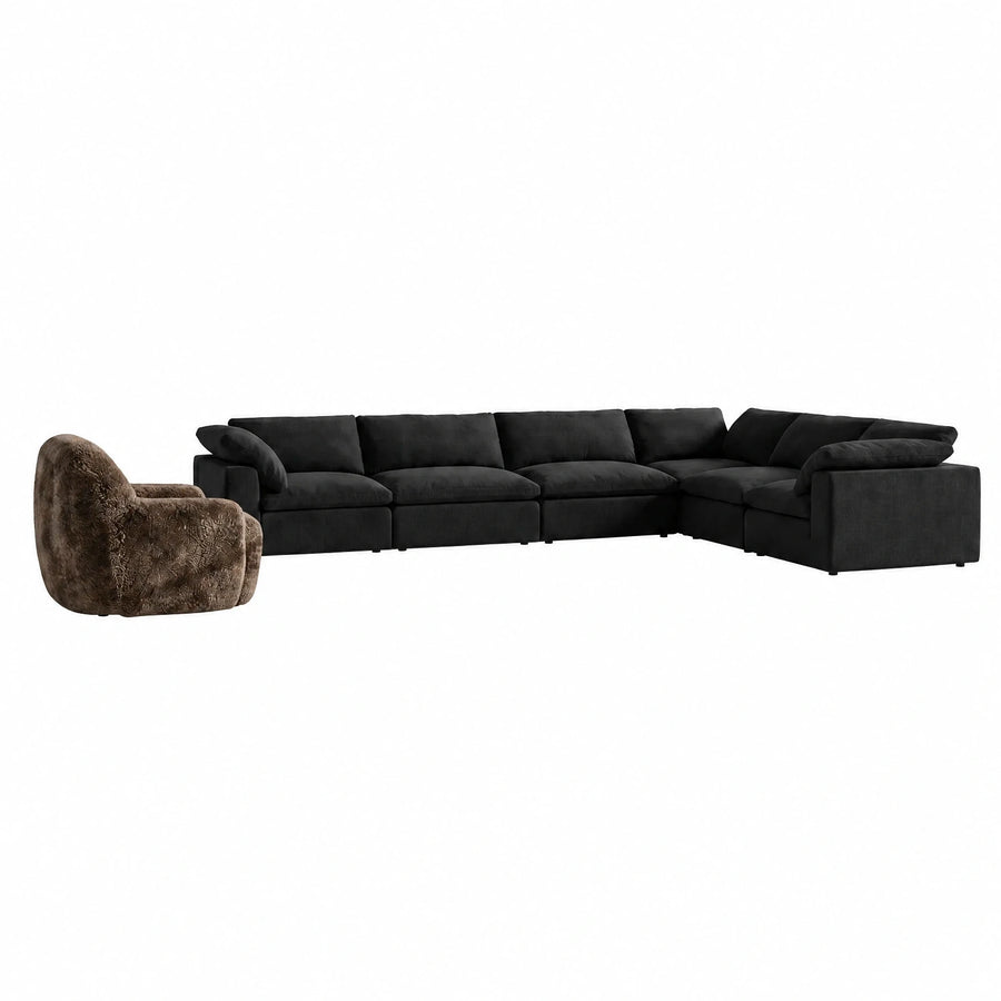 Black Modular Sectional Sofa with Brown Boucle Accent Chair