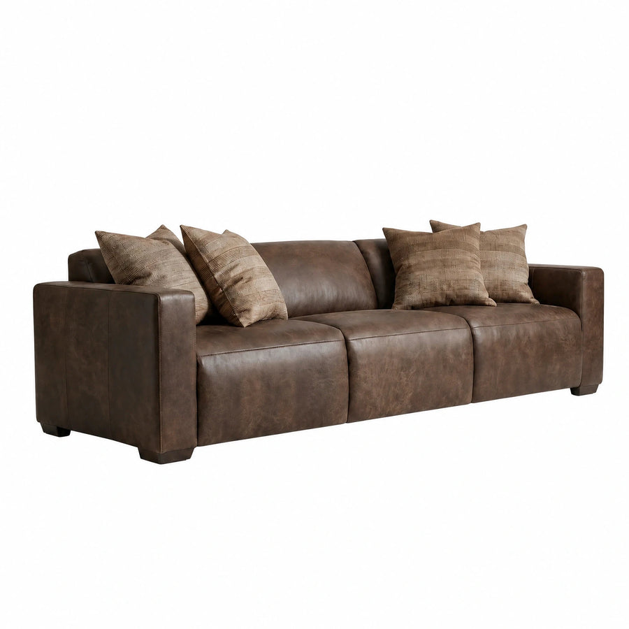 Brown Leather Sofa with Textured Throw Pillows