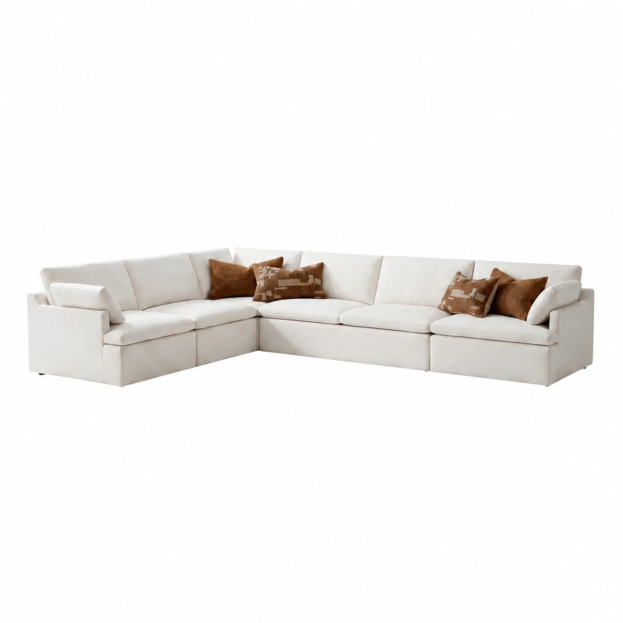 White Modular Sectional Sofa with Brown Pillows