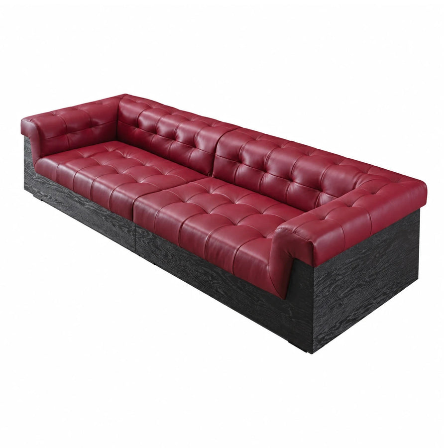 Red Tufted Leather Sofa with Dark Wood Base