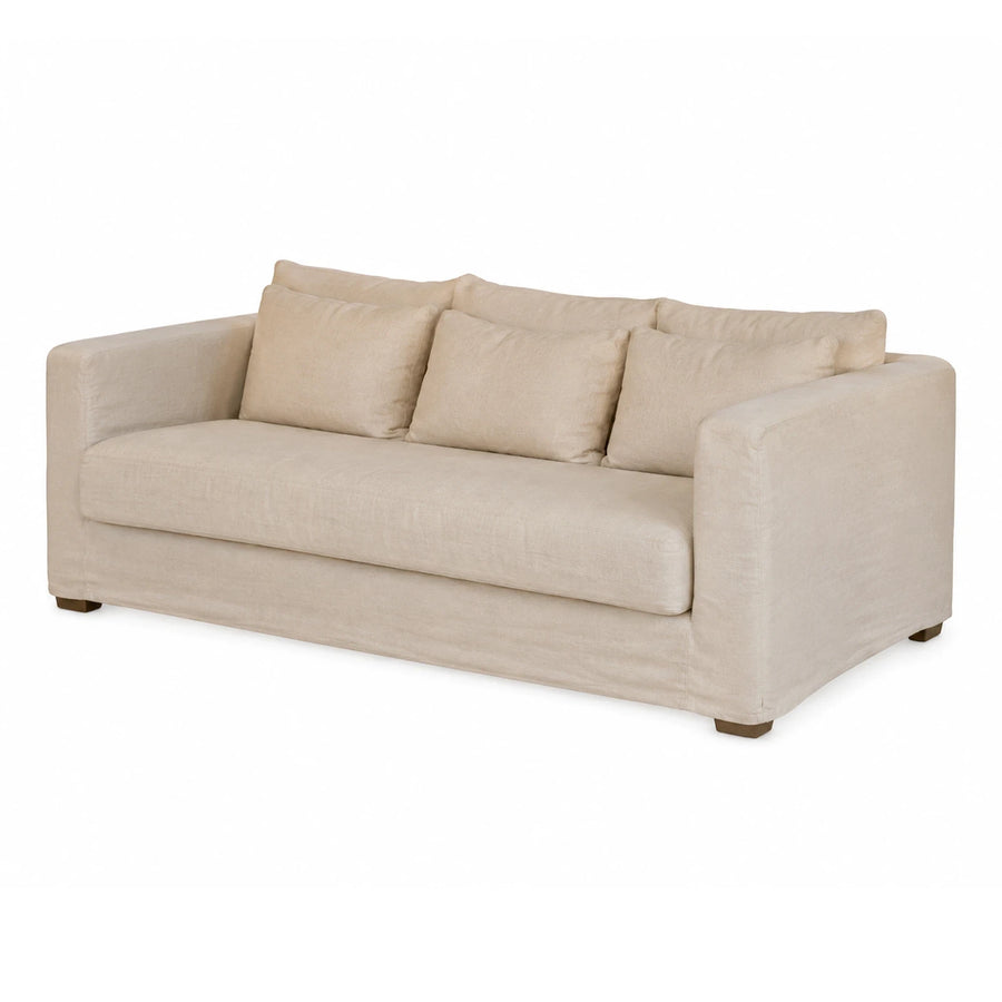 Beige Fabric Three-Seater Sofa with Throw Pillows