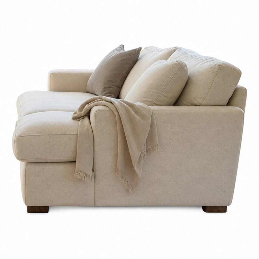 Beige Fabric Sofa with Chaise and Throw Pillows