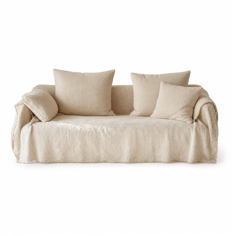 Beige Fabric Sofa with Throw Blanket and Pillows