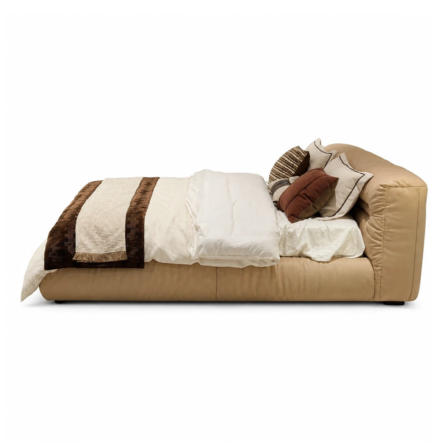 Beige Leather Daybed with Pillows and Throw