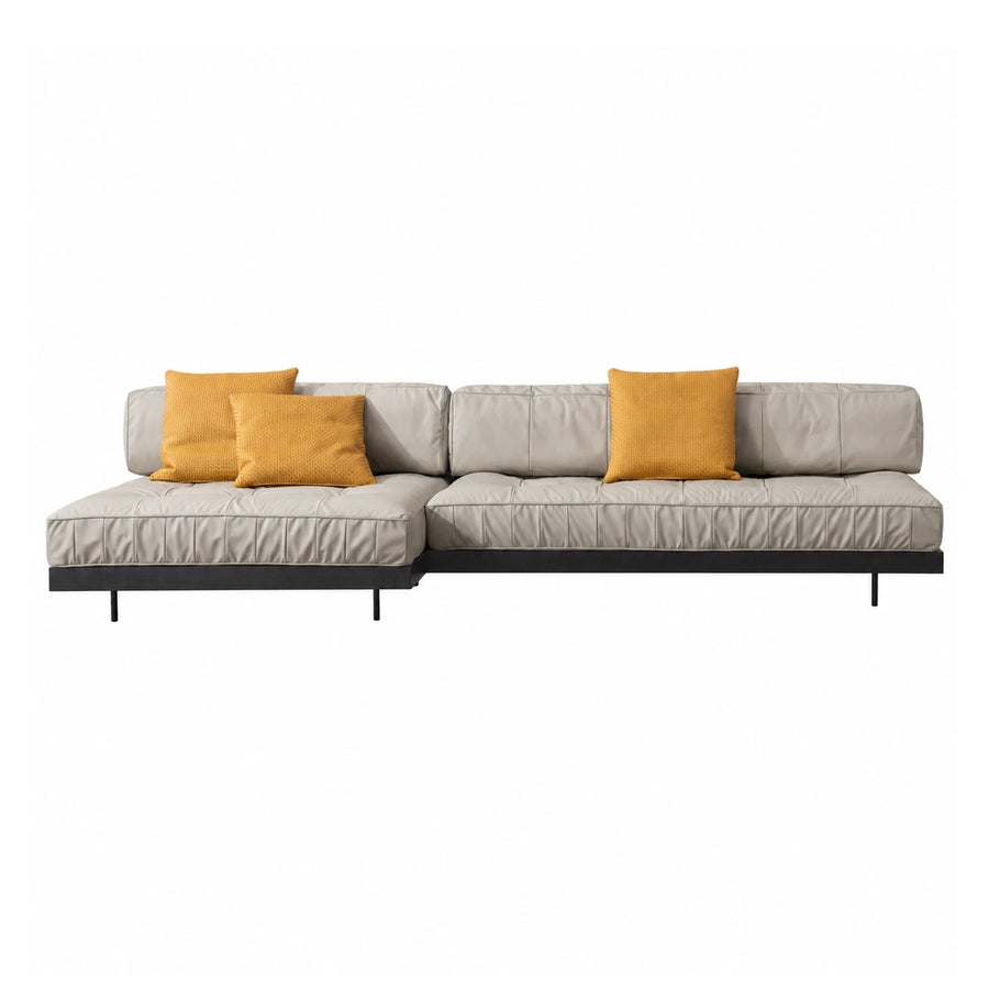 Modern Beige Leather Sectional Sofa with Yellow Pillows