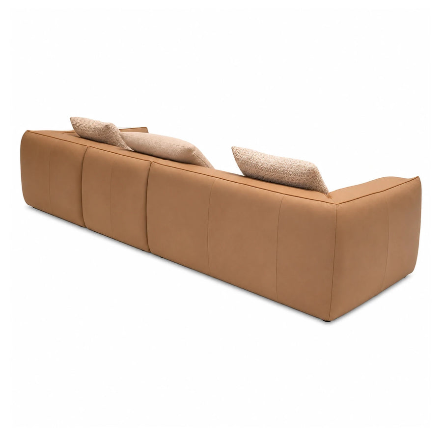 Tan Leather Modular Sofa with Textured Pillows