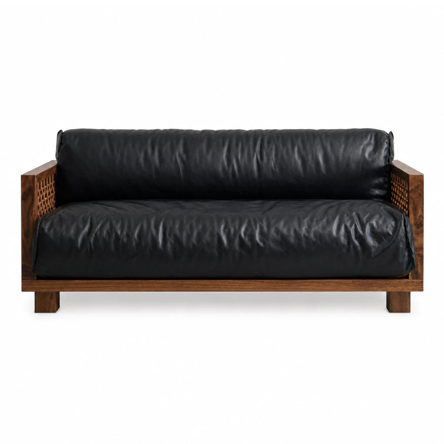 Black Leather Sofa with Wooden Frame and Cane Details