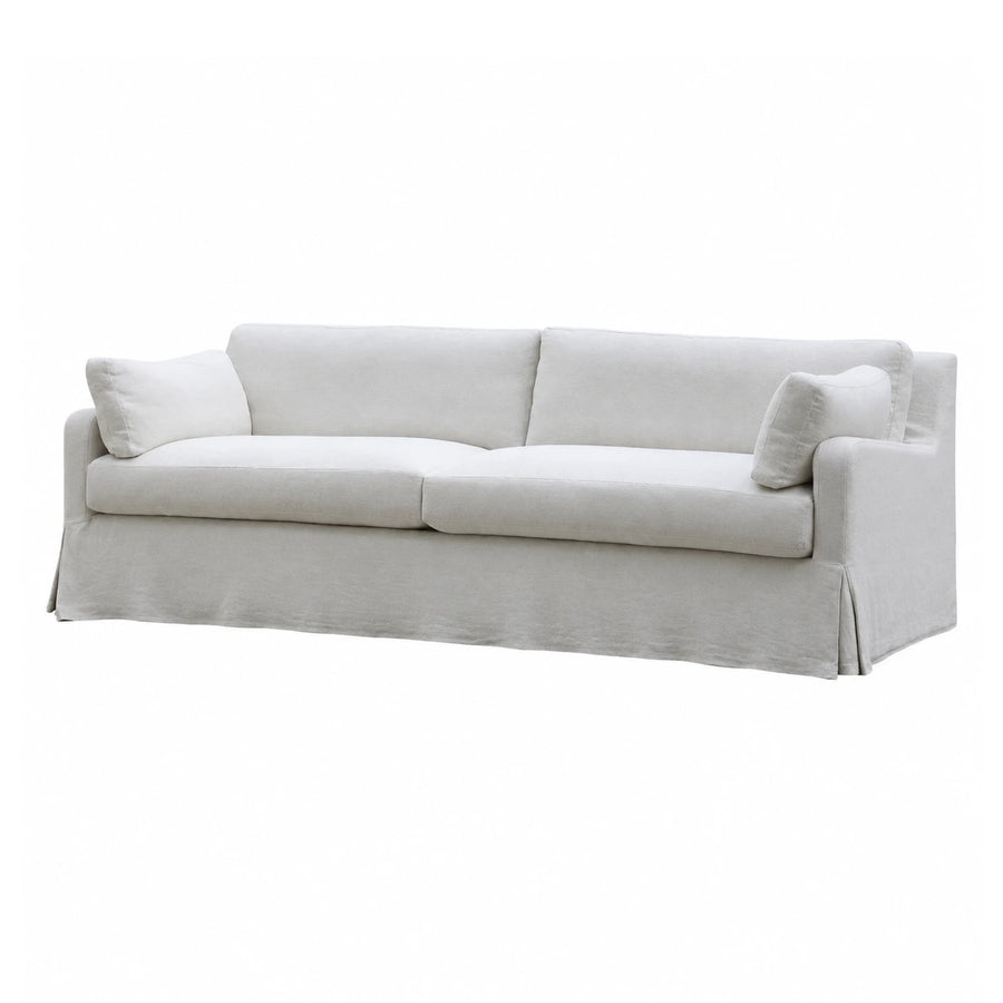 White Fabric Sofa with Skirted Base and Throw Pillows