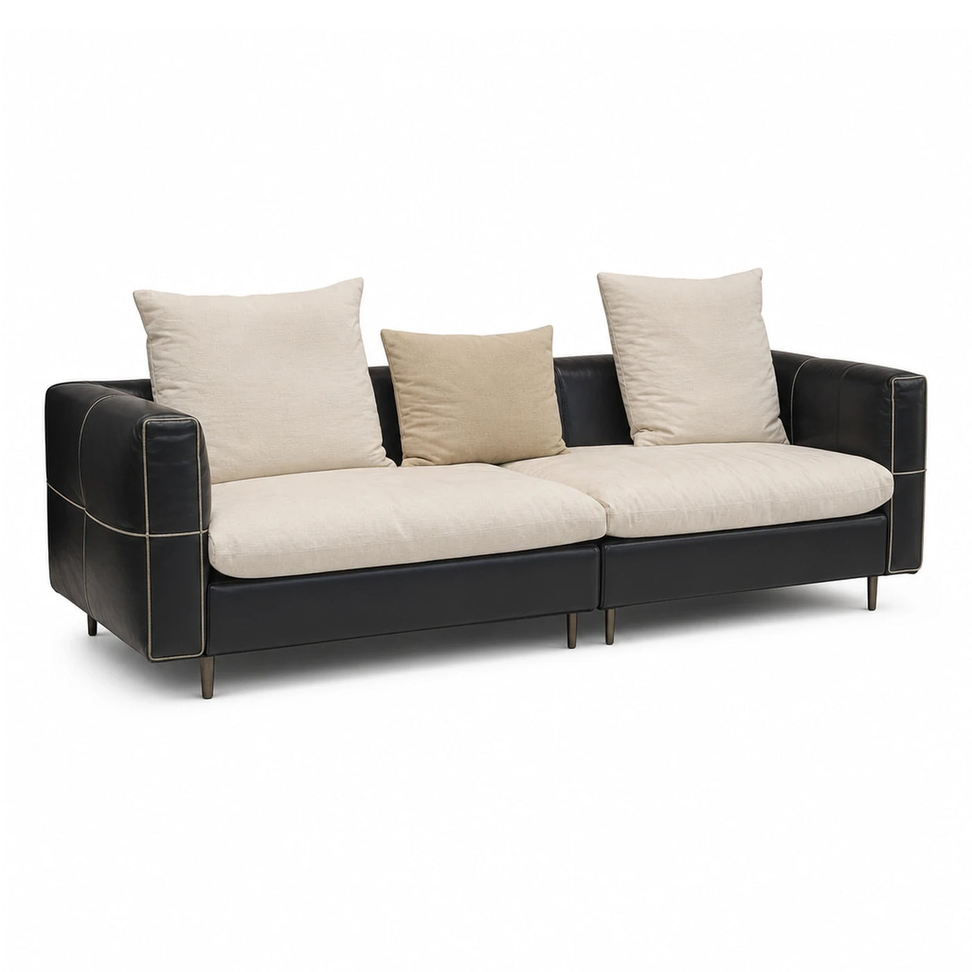 Black Leather Sofa with Cream Cushions and Contrast Stitching