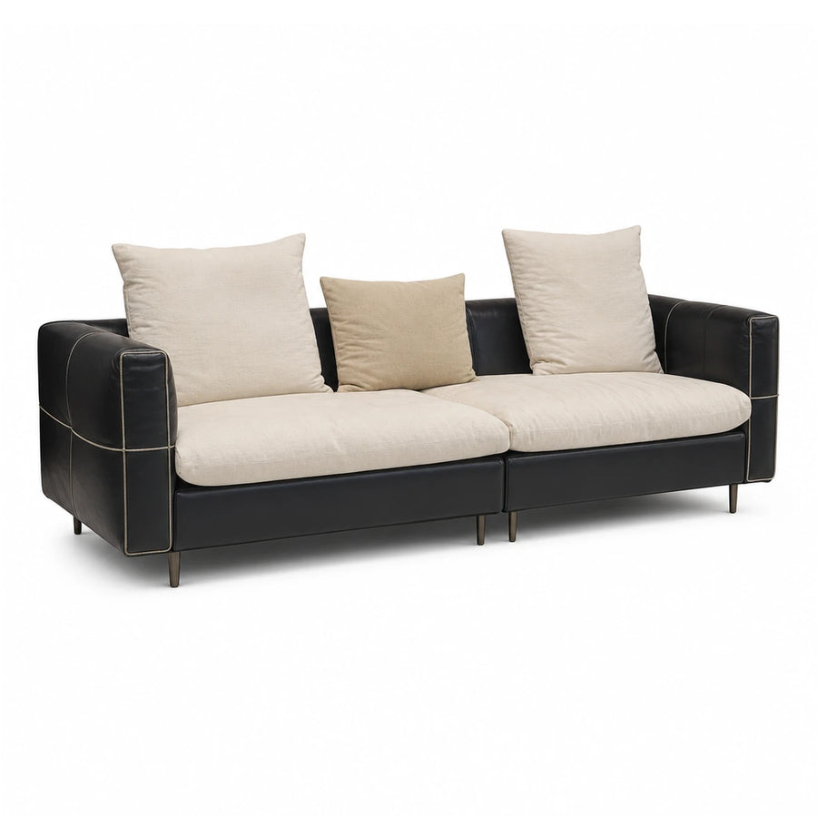 Black Leather Sofa with Cream Cushions and Contrast Stitching