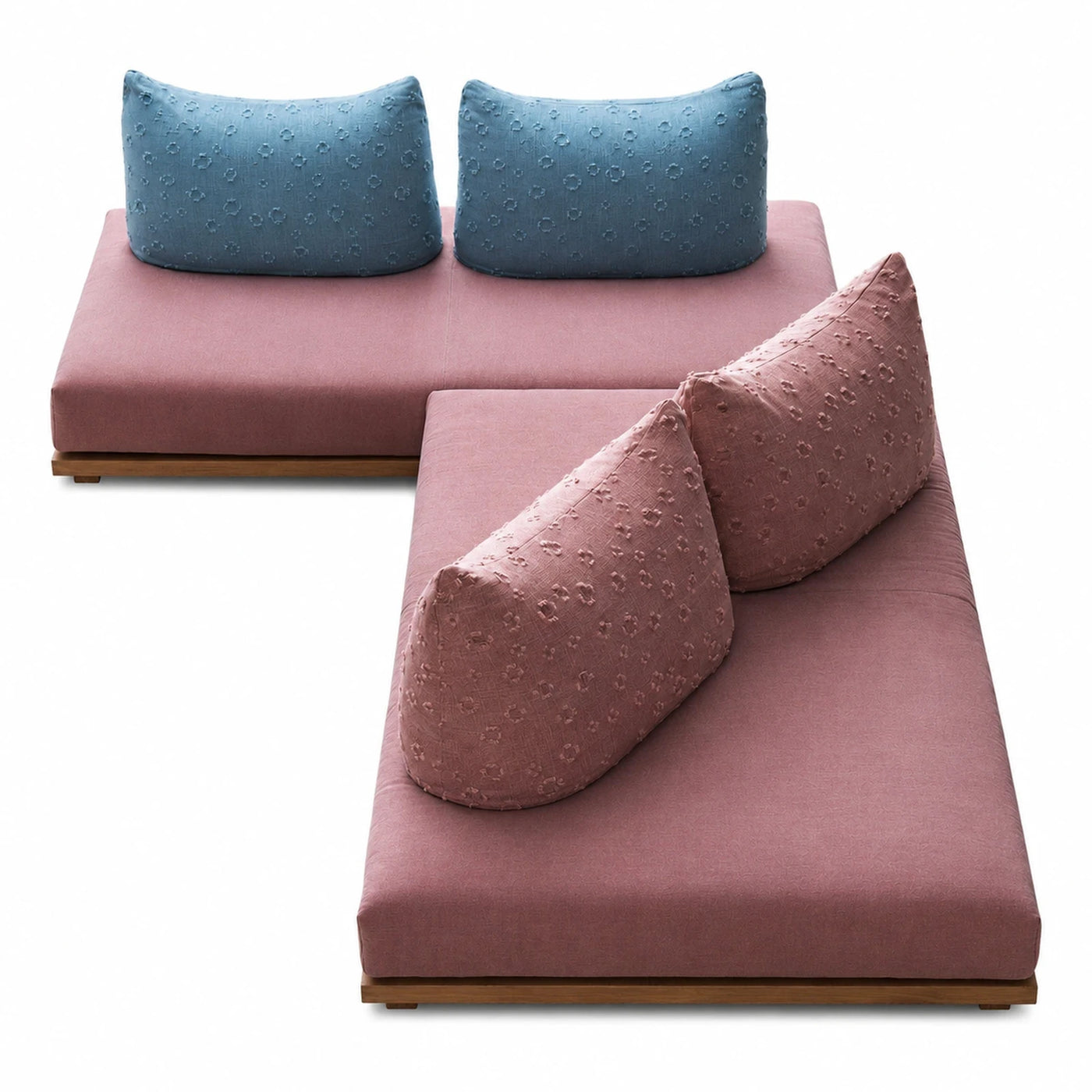 Modular Pink Fabric Sofa with Blue Pillows